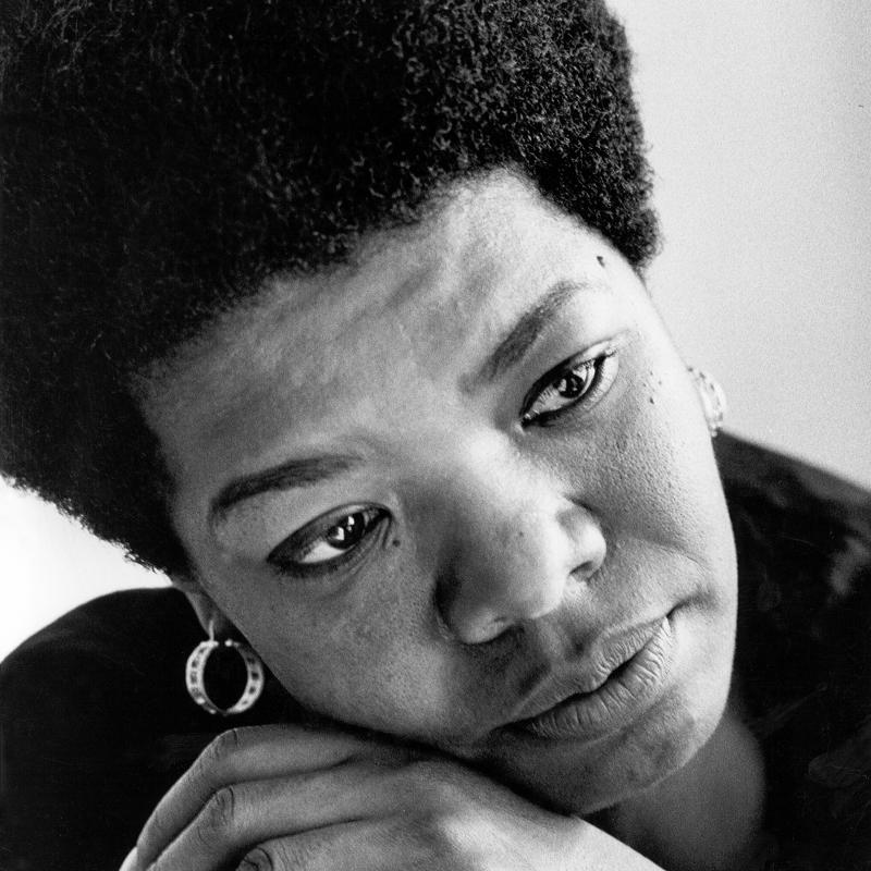 African American author Maya Angelou looks off-camera in a close-up portrait