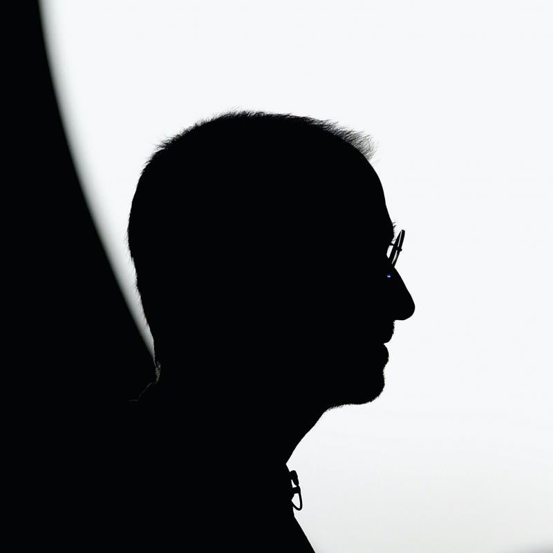 A profile image of Steve Jobs' silhouette in black and white