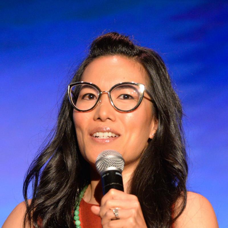 Comedian and actor Ali Wong speaks into a mic on stage